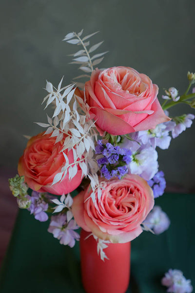 bud vase arrangement; peach roses