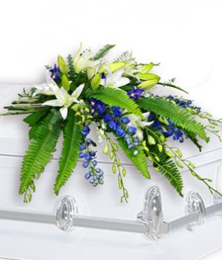 casket white and blue flowers; funeral flowers for casket