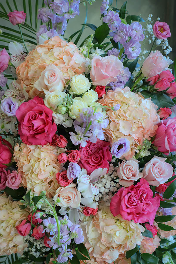 delicate funeral flowers; funeral standing spray; white and pink lavender funeral flowers; flower delivery ottawa