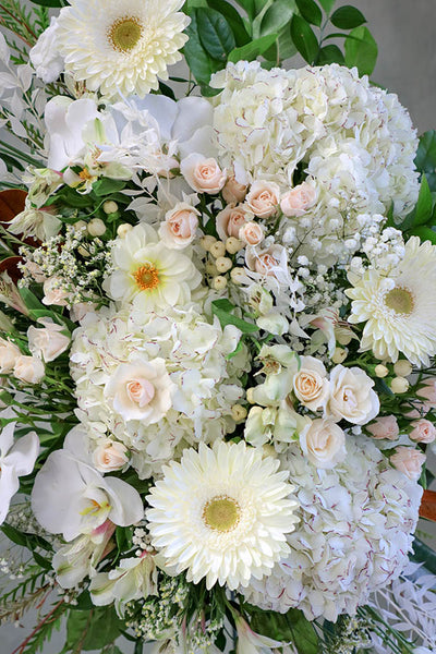 all white funeral spray; funeral standing spray; funeral flowers