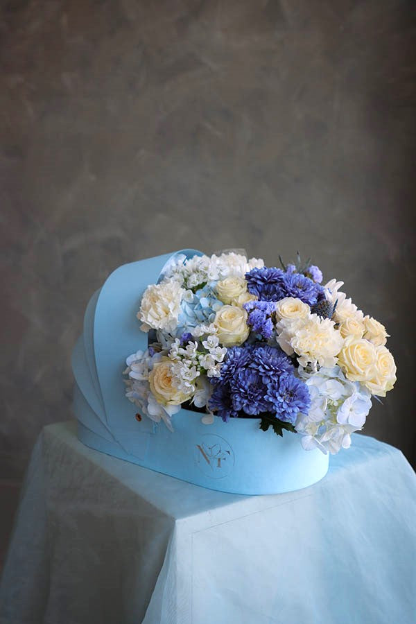 flower crib; flowers in a crib; baby boy flowers; blue flower bouquet; baby boy arrangement