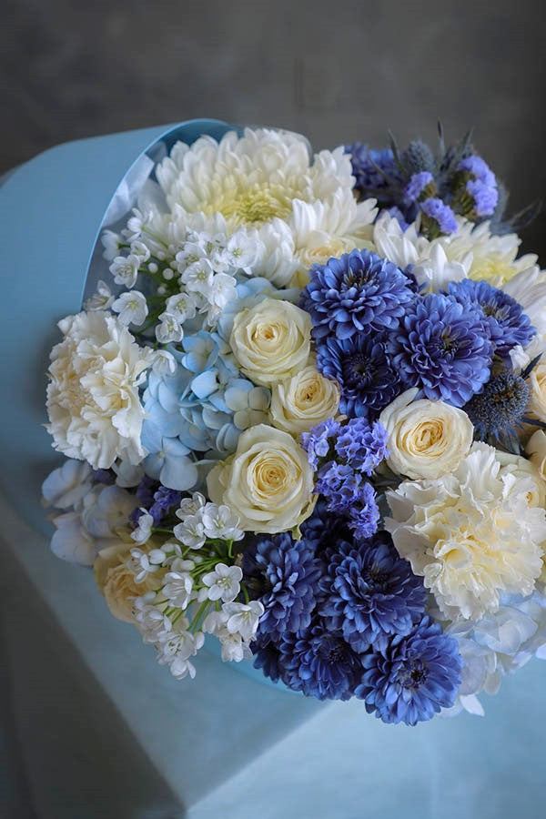 flower crib; flowers in a crib; baby boy flowers; blue flower bouquet; baby boy arrangement