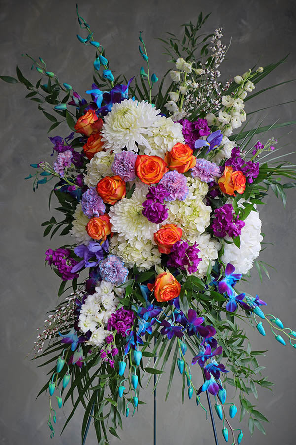 blue funeral flowers; blue spray; colorful funeral flowers; sympathy flowers ottawa