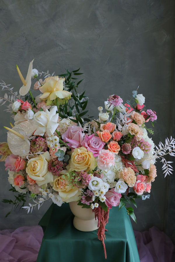 Pastel floral arrangement with blush roses, lisianthus, and carnations – Ottawa flower delivery