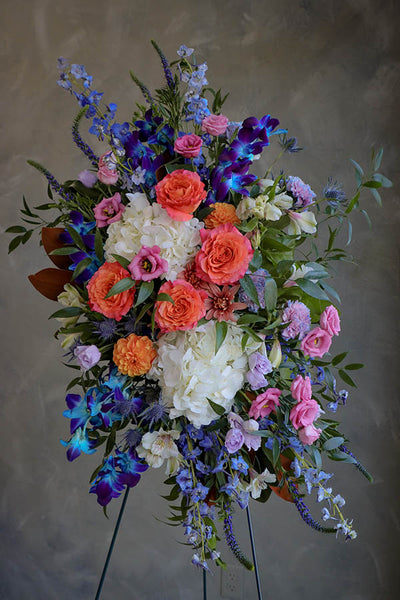 blue funeral flowers; blue spray; colorful funeral flowers; sympathy flowers ottawa
