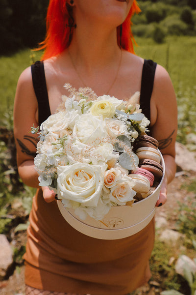 Creamy Dreamy Flower Macaron Box with white and cream flowers, lush greenery, and local macarons by Ottawa florist.