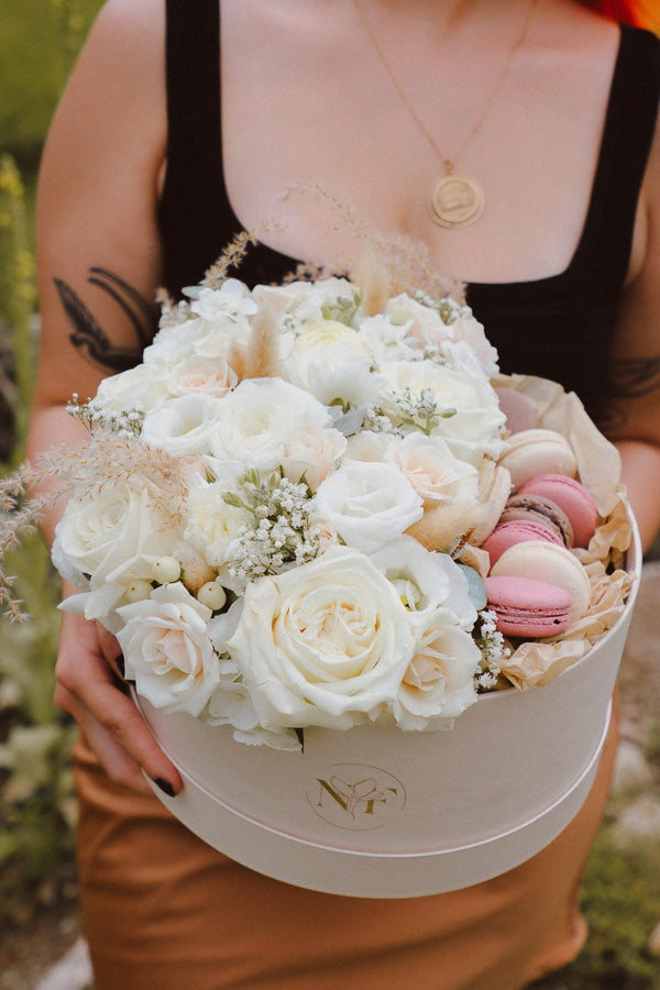 Creamy Dreamy Flower Macaron Box with white and cream flowers, lush greenery, and local macarons by Ottawa florist.