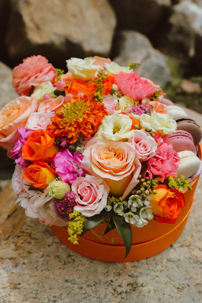 Peach & Pink Flower Macaron Box with pink and orange flowers and local macarons by Ottawa florist.