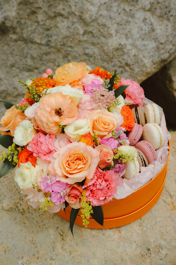 Peach & Pink Flower Macaron Box with pink and orange flowers and local macarons by Ottawa florist.