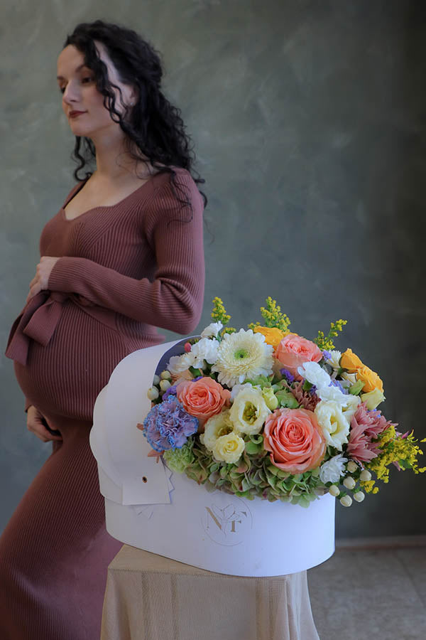baby flowers; gender neutral flowers; flowers for a birth of a baby; flower crib; flowers in a crib