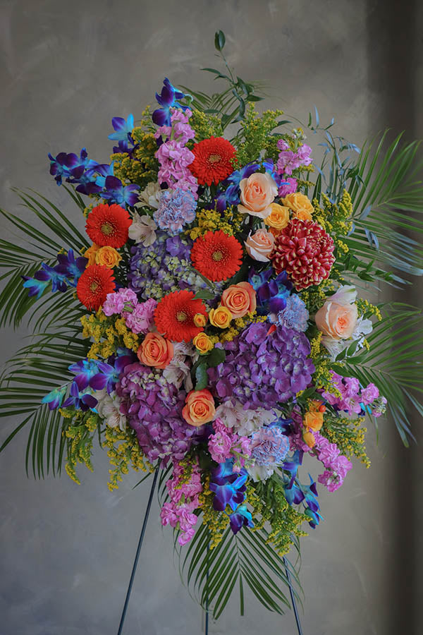 colorful funeral standing spray; cheerful funeral flowers; funeral spray; funeral flowers ottawa
