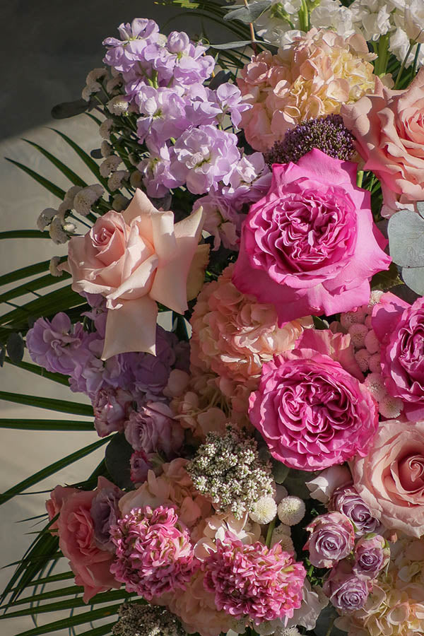 delicate funeral flowers; funeral standing spray; white and pink lavender funeral flowers; flower delivery ottawa