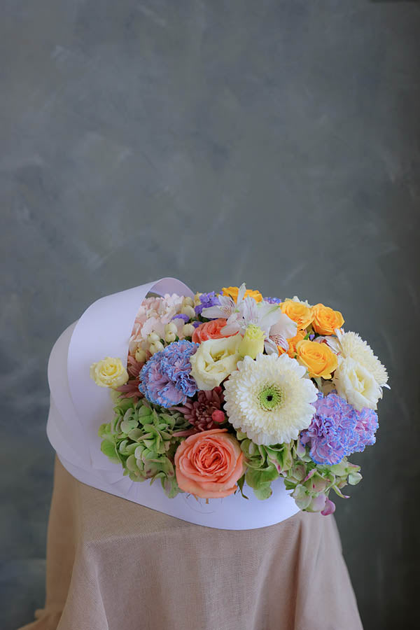 baby flowers; gender neutral flowers; flowers for a birth of a baby; flower crib; flowers in a crib