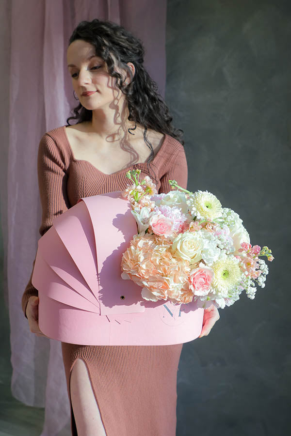 pink baby girl flowers; pink flower crib; flowers in a crib; baby girl flower arrangement; baby shower flowers 
