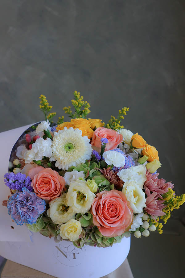 baby flowers; gender neutral flowers; flowers for a birth of a baby; flower crib; flowers in a crib