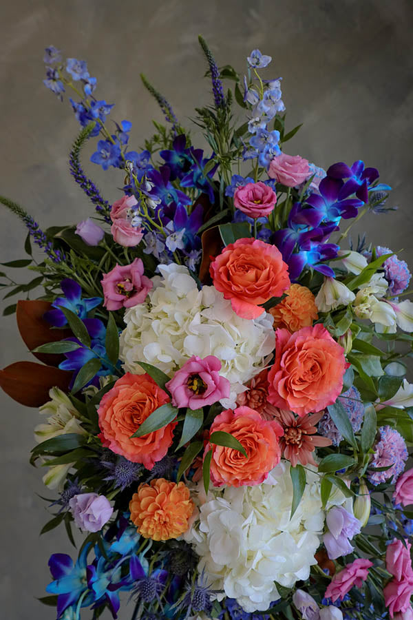 blue funeral flowers; blue spray; colorful funeral flowers; sympathy flowers ottawa