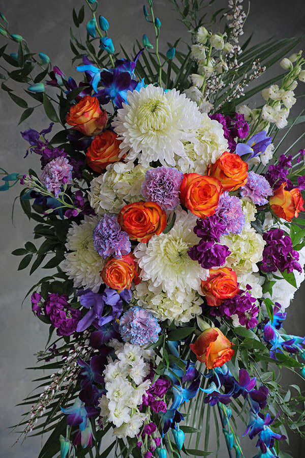 blue funeral flowers; blue spray; colorful funeral flowers; sympathy flowers ottawa