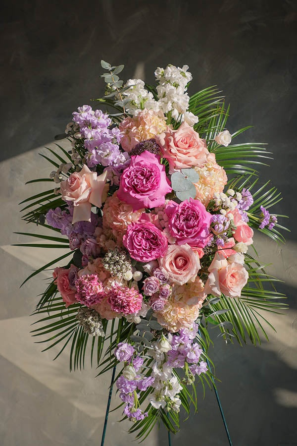 delicate funeral flowers; funeral standing spray; white and pink lavender funeral flowers; flower delivery ottawa