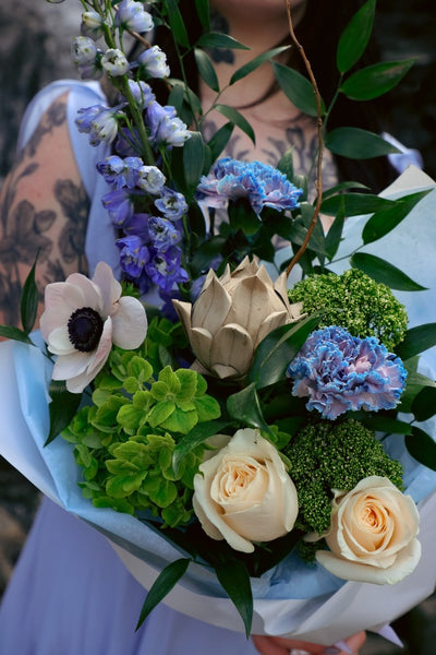 white and blue bouquet; ottawa florist; lilies delphinium roses hydrangea bouquet; blue flowers