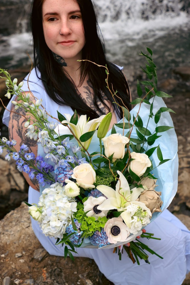 white and blue bouquet; ottawa florist; lilies delphinium roses hydrangea bouquet; blue flowers