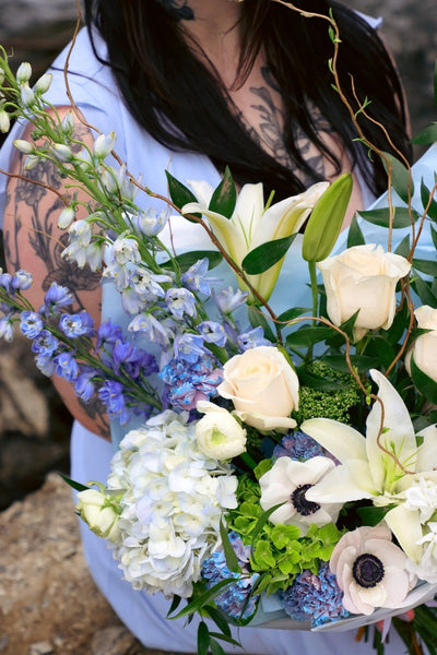 white and blue bouquet; ottawa florist; lilies delphinium roses hydrangea bouquet; blue flowers