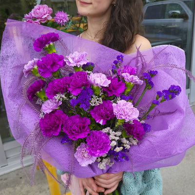 small bouquet; purple flowers; purple bouquet; bouquet of purple carnations