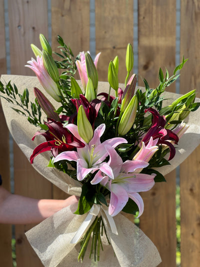 oriental lilies bouquet; lilies in a vase