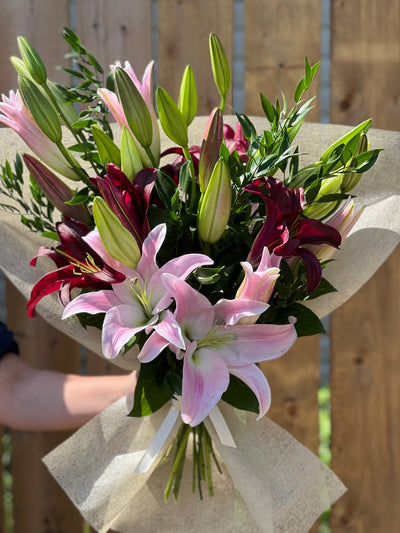 oriental lilies bouquet; lilies in a vase