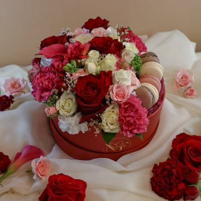 flowers in a box, flower macaron box, red flowers, romantic bouquet, romantic flowers