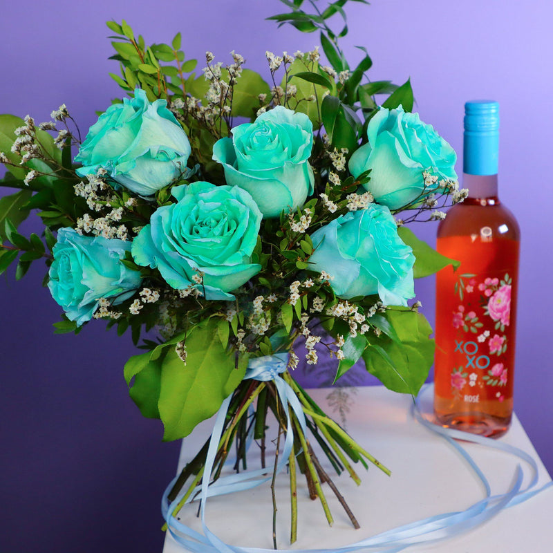 roses and wine; blue roses bouquet; flowers with rose wine; turquoise roses