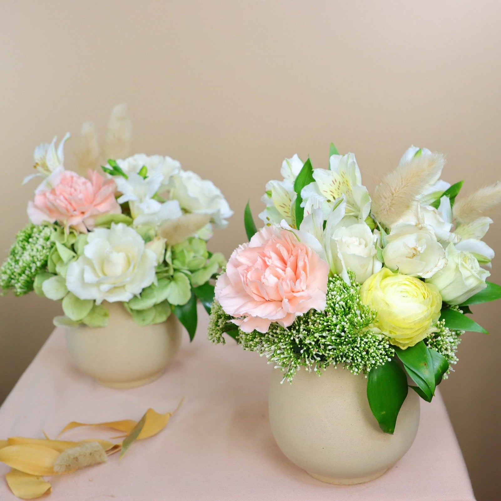 flower duo; gentle flower arrangement in ceramic vase; two flower arrangements; gentle flowers; elegant flowers