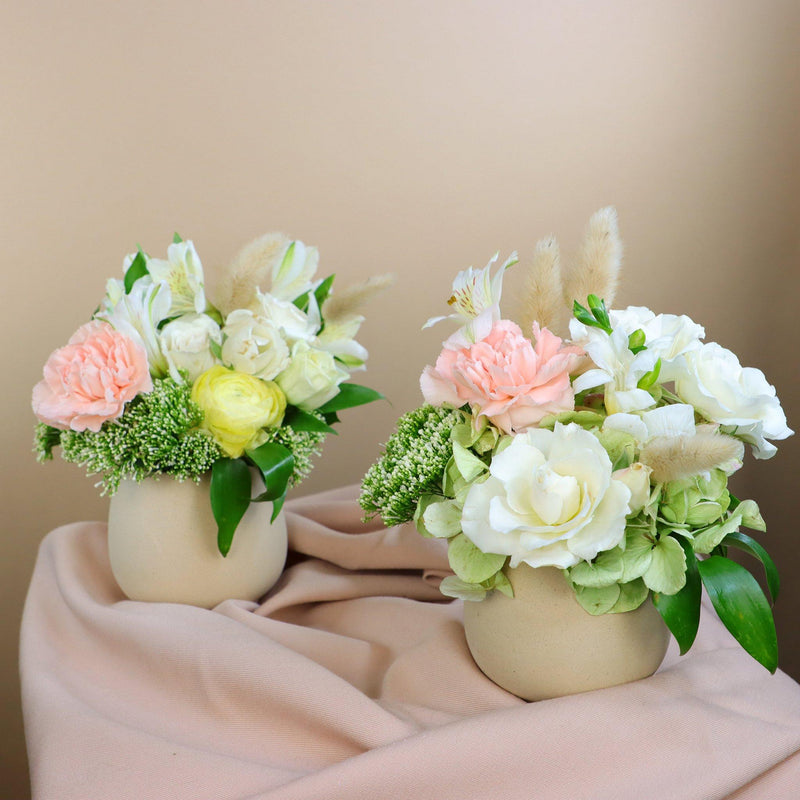 flower duo; gentle flower arrangement in ceramic vase; two flower arrangements; gentle flowers; elegant flowers