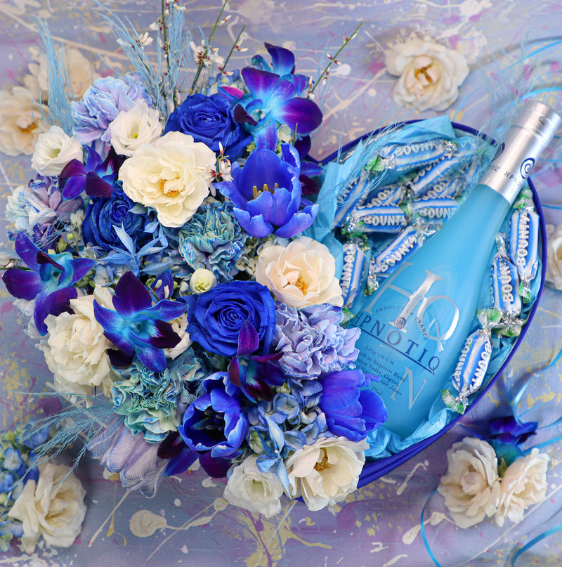 blue flowers; flowers in a heart; flowers and wine; flowers and liquor; blue flower bouquet; flowers in a box