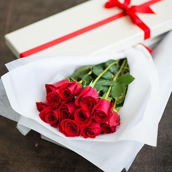 12 long stemmed  red roses in a presentation box