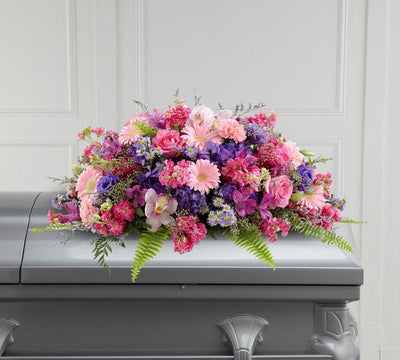 casket flower spray; casket flowers for funerals; pink, purple funeral flowers